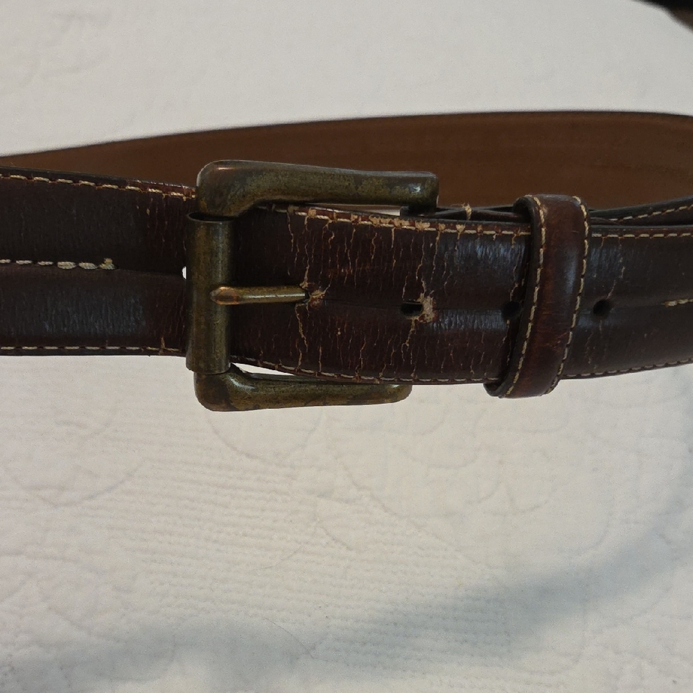 Brown Leather Belt Bag with Adjustable Straps and Metal Hardware